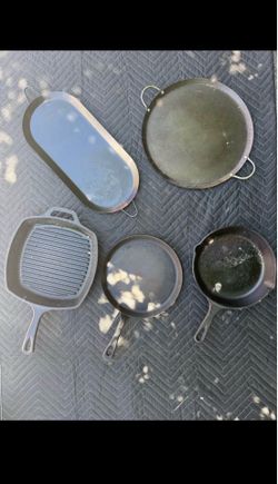 cast iron skillets and metal trays