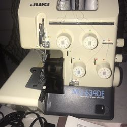 Had No Use Juki Surger Sewing Machine With 4 Spool Redder