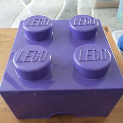 Purple Lego storage brick full of assorted legos