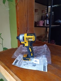 DeWalt 20 v New BL.  Impact.  W/ cilp