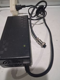 Li-ion charger
MODEL : DCSP4202
INPUT:  AC 100-240 V -
50/60 Hz

OUTPUT :  DC 42 .0 V= 2.0A.

good condition.