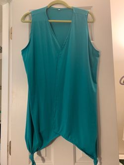 This is a sleeveless tunic style vest