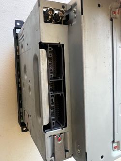 OEM stock radio for 2011 Dodge Challenger / Charger with 6 slot built in cd changer.