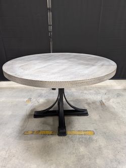 Distinctive Grey Textured Round Tabletop with Black Metal Base