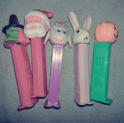 Various vintage PEZ containers