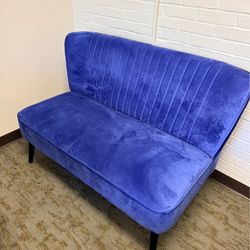 Blue velvet channel tufted loveseat