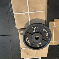 35 Lb Cast Iron Olympic Plates Brand New Still In The Box $1 Per Pound 