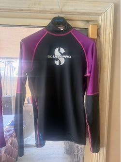 Special price, brand new. Scubapro UPF 50 long-sleeve rash guard for women. I have three available in sizes 2, 4, and 6 (XS, S, and M).