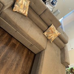 Gray Sectional And Swivel Chair