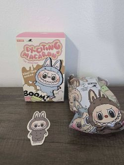 uthentic POP MART THE MONSTERS Exciting Macaron Vinyl Face collectible.