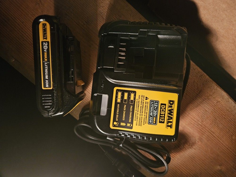 1 dewalt battery and a charger (Firm 40.00)
