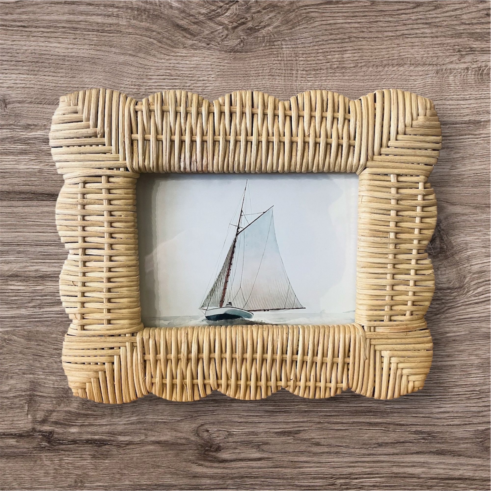 11 1/4” W x 9 1/2” H Scalloped Braided Wicker Frame (w/ Sailboat Print Included)
