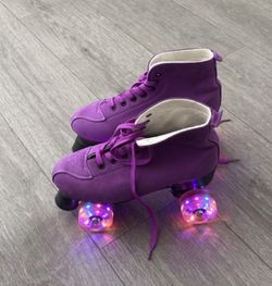 Purple suede roller skates