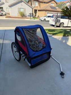 Schwinn Trailblazer Double Bicycle Trailer, in the blue/red/black color