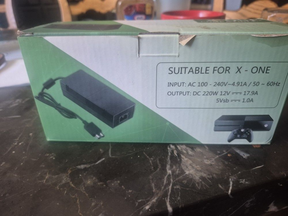 X One Cargador Nuevo $69