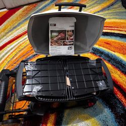 Brand New! Weber Q2200 Portable Gas Grill bundle with Portable Cart, Griddle, set of 10 Drip Pans and Cover