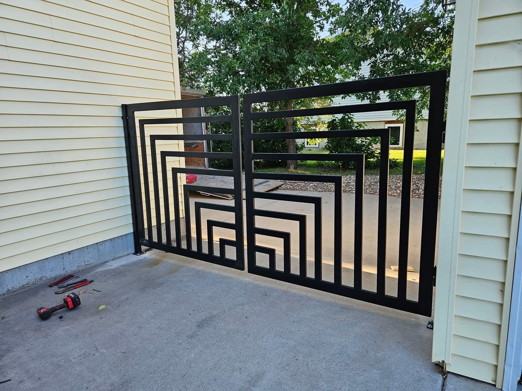 Modern Metal Driveway Gate with Geometric Design