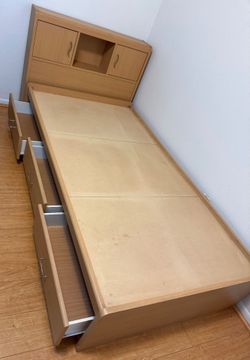 Twin size bed with drawers