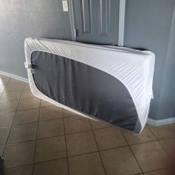 Bed With Mattress Proctector