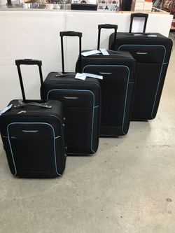 4 pice luggage set includes X-Large size (32 "), large size (28"), medium size (24") and Carry-on size (20")