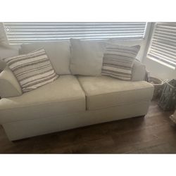 Jeromes furniture Couch and Love Seat
