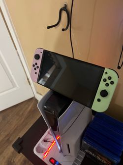 Nintendo Switch Bundle - LED TV Dock, Extra Joy-Cons, Case, Mario Wonder