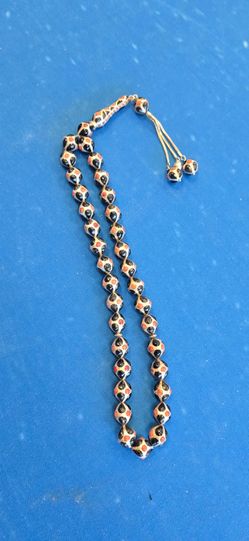 stunning piece is an authentic antique Yusr (black coral) Misbaha 925 silver