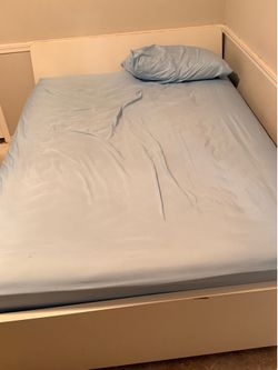 Full size White platform bed with slats