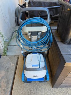 Dolphin S200 pool robot cleaner with dock. Works great!