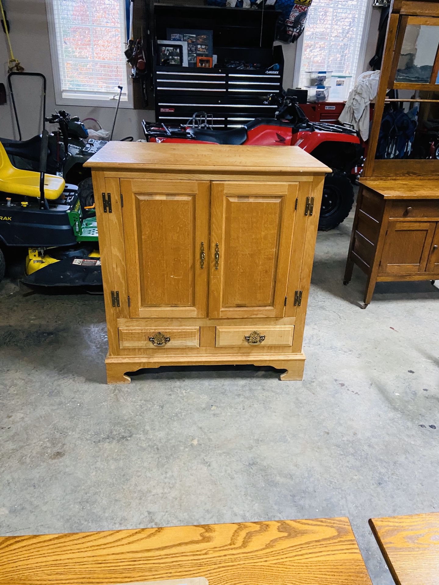 Small Cabinet for Entry way or Books . Has a few a few Discoloration spots on top.It has an opening in back but comes shelves.