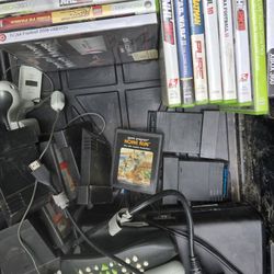 XBOX 360 PLUS 43 GAMES AND 9 ATARI GAMES