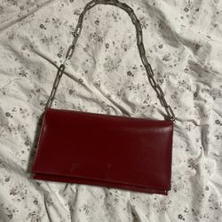 red leather bag w chain 