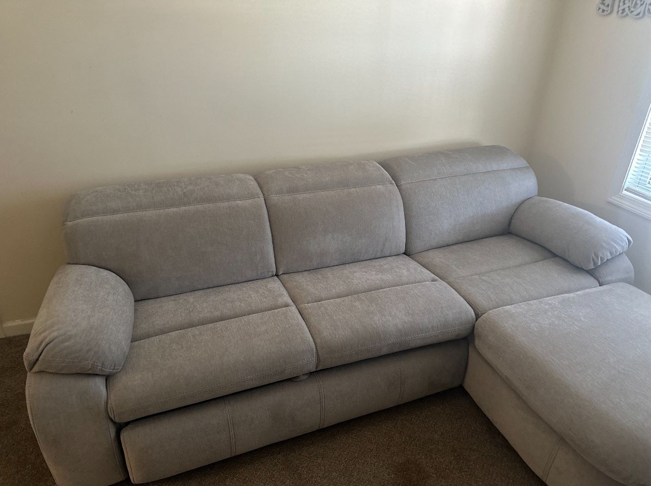 3-Piece Chaise with pop up sleeper and storage