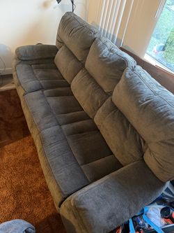 2-Piece Gray Reclining Sofa Set – Like New Condition