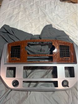Dodge Ram Dash Radio/Climate Control Bezel – Woodgrain OEM