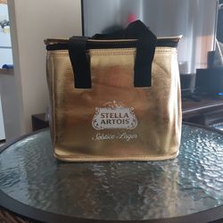 Shiny golden cooler bag Is perfect for camping keeping  food Ice cold and or beverages! 