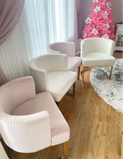 Luxurious plush 4 pink and 2 beige velvet upholstery dining chairs. Rich gold-finished stainless steel base