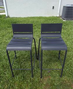 Selling 2 outdoor metal stools.