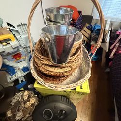Wicker Baskets And Metal Buckets