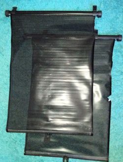 Retractable vehicle window covers
