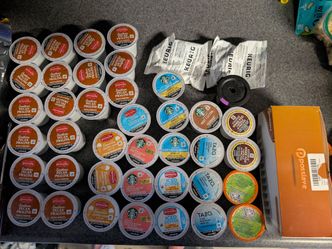 34 Assorted Keurig K cups and water filters