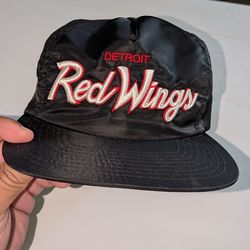 Mitchell & Ness Detroit Red Wings vintage script snapback hat.
