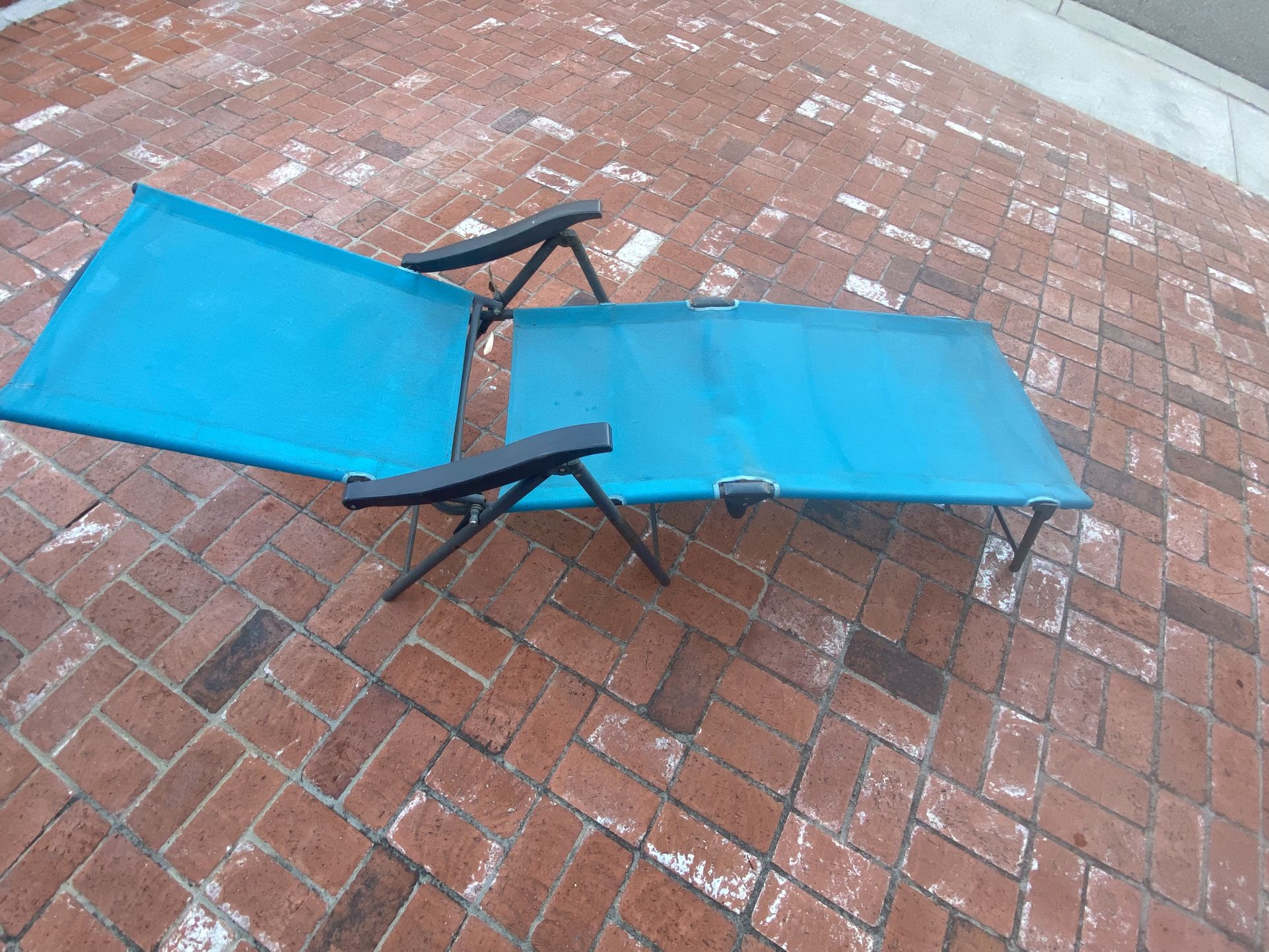 Two Folding Lounge Chairs