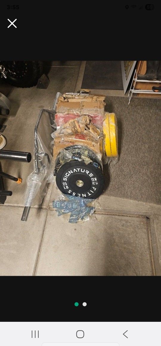 Brand New Barbell Rubber Plates.