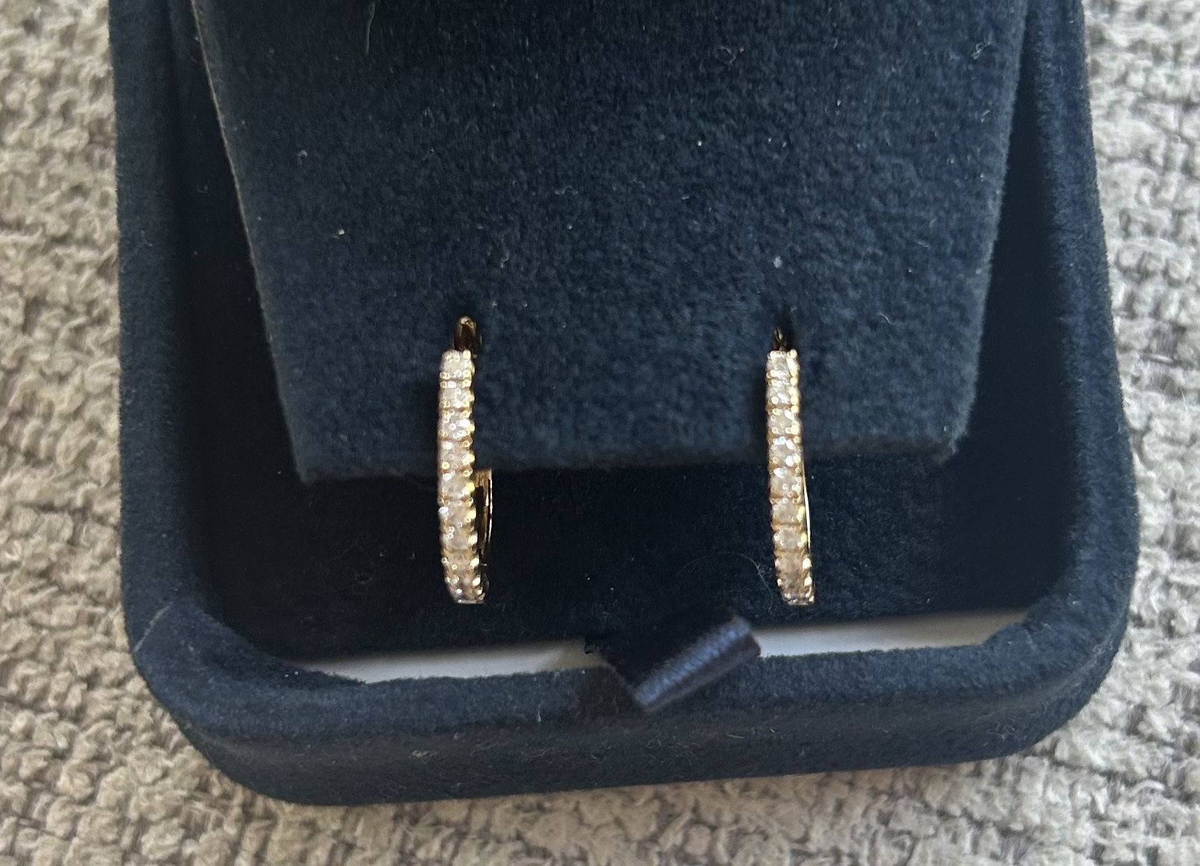 14 Karat Gold Hoop Earrings. Never Worn. 0.24 Total Weight Round Brilliant Diamonds. Receipt Available