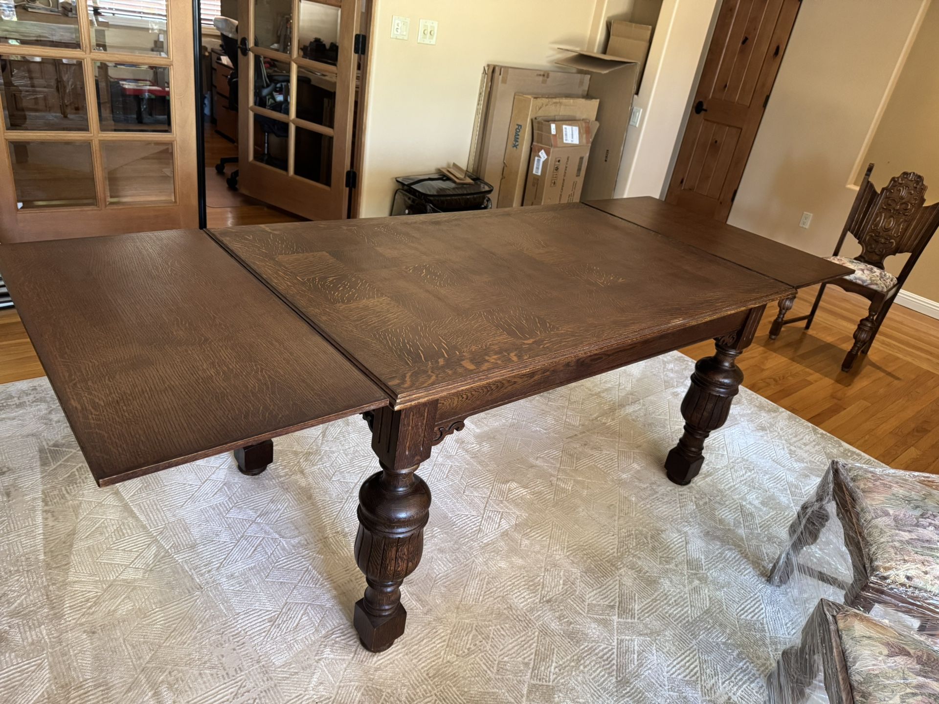 Antique Victorian dining table with two leaf extension and six chairs