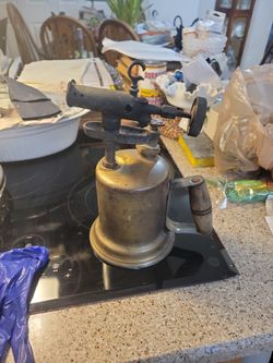 Early nineteen hundred brass with wooden handle blow torch gasoline fueled