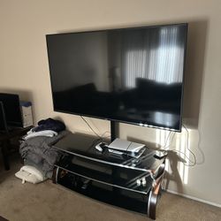 Black TV Stand with Glass Shelves – Modern and Sturdy!
