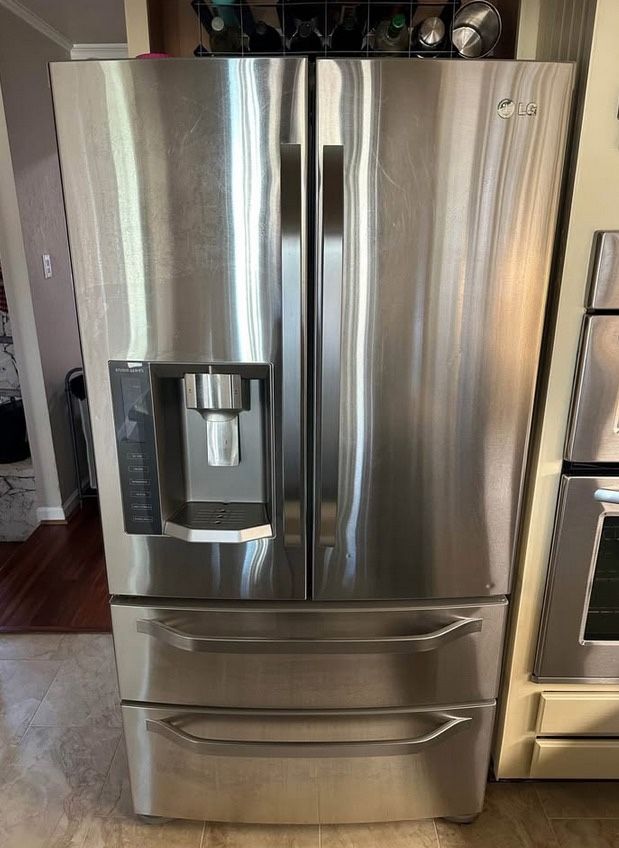 LG double door stainless fridge used like new