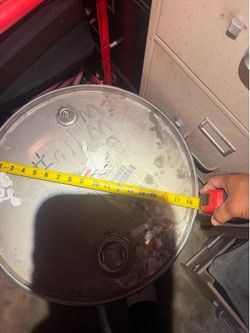 25 gallon drum the top of the barrel is not removable could be used for diesel gas acetone pretty much anything stainless steel
